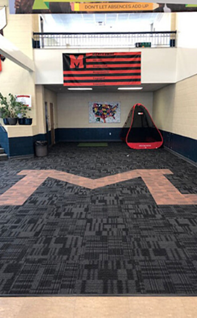 school entrance with carpet