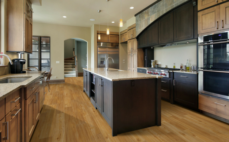 luxury vinyl replicating hardwood flooring in kitchen